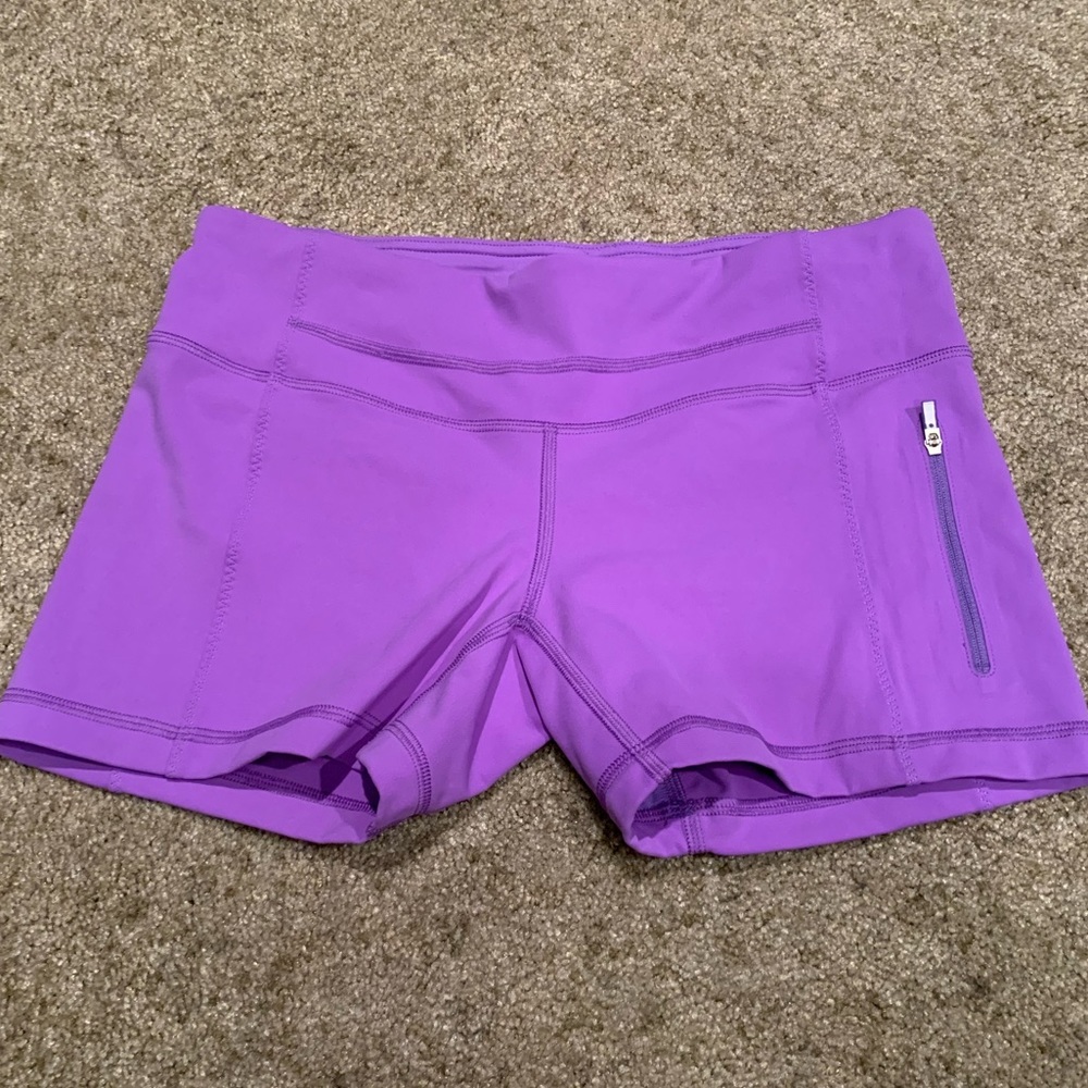 Lululemon purple spandex shorts.